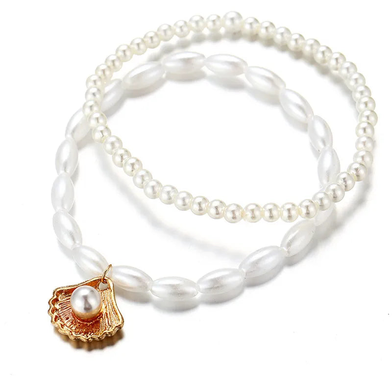 Modyle New Fashion Bohemian Simulated Pearl Chain Wedding Anklet Bracelet for Women Gold Color Shell Pendant Anklet Jewelry Gift